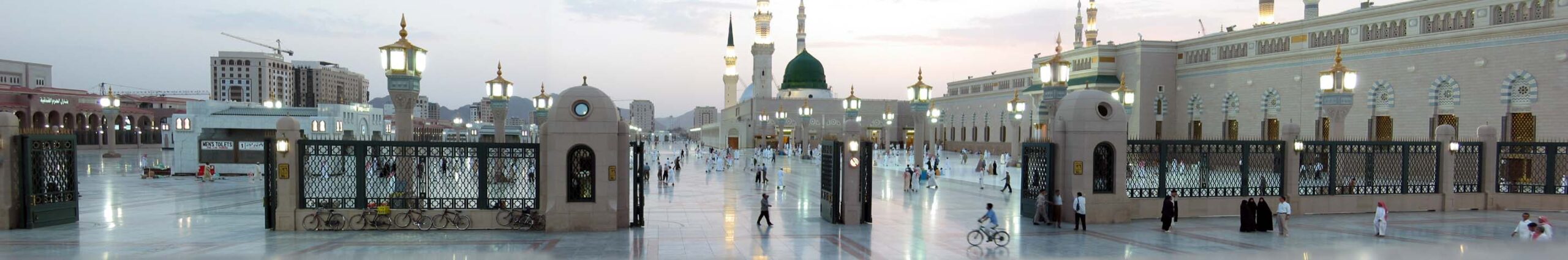 Mujhe Darbar-e-Mustafa Le Chal naat - Beautiful view of Masjid al-Nabawi at sunset with green dome representing the court of Prophet Muhammad ﷺ